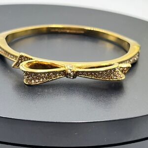 Kate Spade NY Love Notes Gold Plated Pave Crystal Bow Hinged Bangle Bracelet